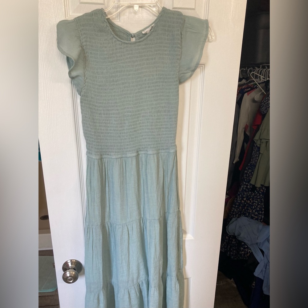 Sage Green Midi Dress fits like a Small/Medium